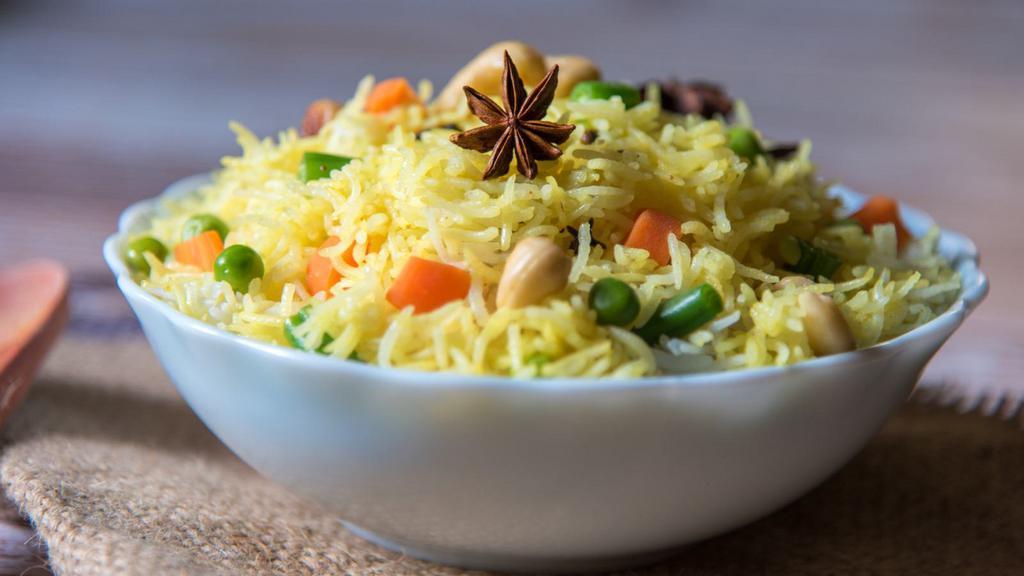 Pilau Rice · Plain basmati rice with special flavor.
