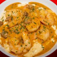Shrimp & Grits Lunch · Pan Seared Shrimp and Cheese Grits with sausage gravy.