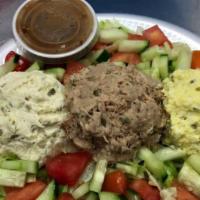 Lifering Salad · Your choice of three scoop of tuna salad, chicken salad, egg salad, or cottage cheese on a b...