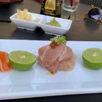 Belly Trio · Assorted tuna, salmon, and yellowtail belly sashimi.