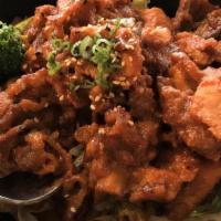 Spicy Pork Bulgogi · Korean marinade. Served with onions and jalapenos with rice.