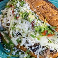 Torta · Mexican sandwich on telera bread spread with black beans and your choice of any kind of meat...