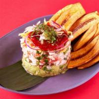 Avocado Ceviche Tower · guacamole, red snapper and shrimp, avocado lime, pineapple pico, mango jicama slaw