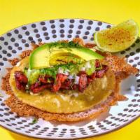 A La Tuma Taco · (voted Top Ten Taco in Texas by Texas Monthly) al pastor taco + fried manchego cheese, roast...