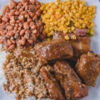 Smothered Ribs · Enjoy 6 delicious pork ribs smothered in our homemade gravy over a bed of white rice, includ...