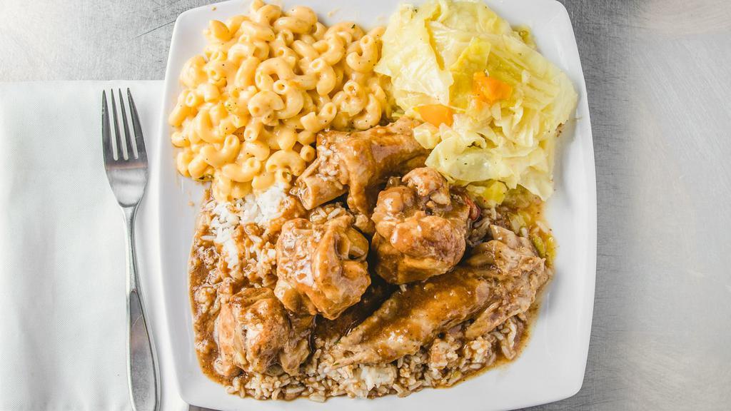 Turkey Wing · Enjoy an entire jumbo turkey wing cut into 5 pieces, served with turkey gravy, white rice, 2 savory side dishes, and cornbread.