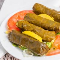 Dolma · Grape leaves stuffed with rice, onions, currants, and spices.