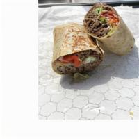 Chicken Wrap · Grilled chicken, lettuce, tomatoes, onions, and tzatziki sauce. Served with fries.