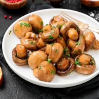 Fried Mushrooms With Mustard · Mouthwatering, Large white mushrooms battered, seasoned, and fried in grapeseed oil. Served ...
