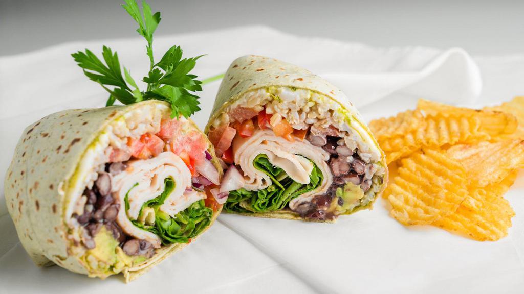 California Wrap · Swiss cheese, turkey, brown rice, black beans, tomatoes, avocado, red onions, baby spinach, mustard, mayo served in a chipotle tortilla.
