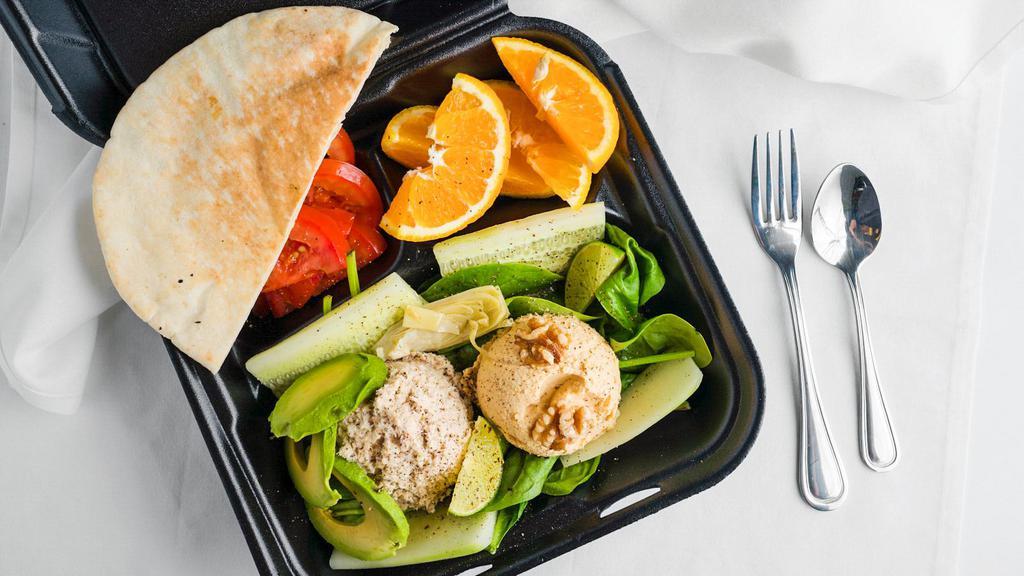 Kaboose Lunch Platter · Scoop of homemade hummus, scoop of our own albacore tuna mix, cucumber, and tomato slices, side of fresh fruit, served with warm pita pocket.