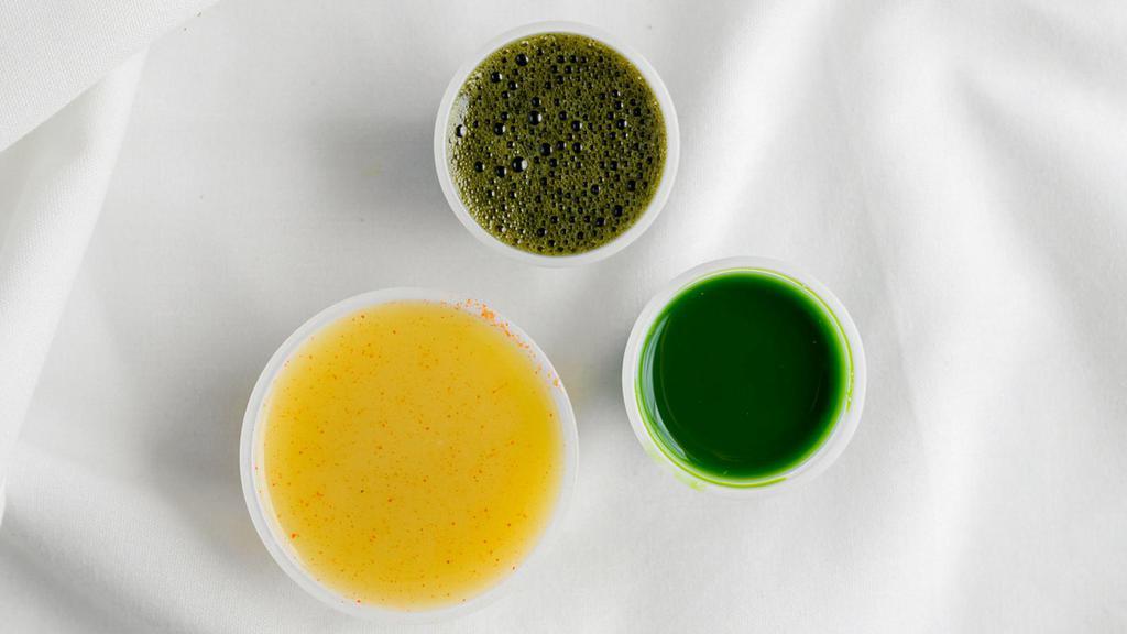 The Flight · A combination of wheatgrass, ginger, and brainon shots.