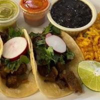 3 Tacos, Rice, Beans & Soda  · This order is served with 1 taco chicken, 1 pastor and 1steak