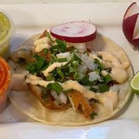 Tacos · Served with onions, coriander, and radishes.

(Barbacoa taco: 1 taco. Served with barbecue s...