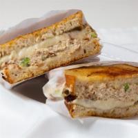 Tuna Melt · Fresh tuna salad melted provolone cheese and alfalfa sprout with tomato and lettuce on grill...