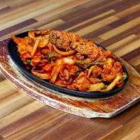 Jeyuk Bokkeum · Stir-fried sliced pork with vegetables in a spicy sauce.