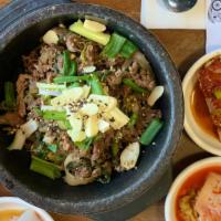 Bulgogi · Thinly sliced beef with a special sauce served a hot pot.