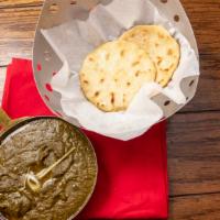 Sarson Ka Saag With Makki Ki Roti · Ground fresh mustard leaves sauce, topped with butter (1pc roti)