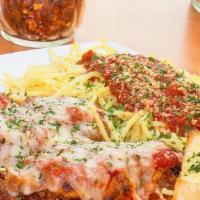 Chicken Parm · Breaded chicken topped with marinara and Mozzarella cheese served with a side of pasta.