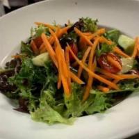 Garden Salad · mixed greens | cherry tomatoes | carrots | cucumbers | black olives | herbed oil & vinegar