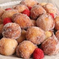 Zeppole · fried dough balls coated with cinnamon and sugar