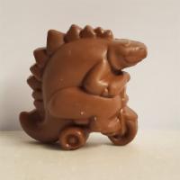 Milk Chocolate Peanut Butter Dino · Creamy peanut butter center enrobed in our heritage milk chocolate and shaped like a dinosaur