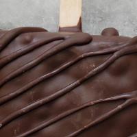 Dark Chocolate Striped Krispie · Rice Krispy treat covered in our rich dark chocolate