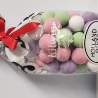 Holland Mints · Fresh mint creme center surrounded by dark chocolate with a colorful sugar shell