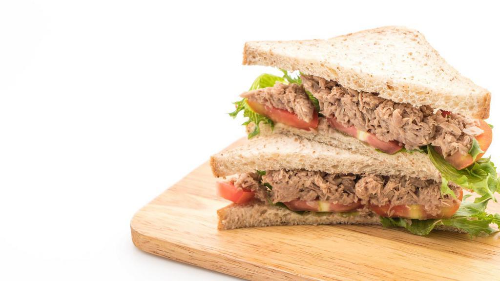 Tuna Salad Sandwich · Our fresh, house-made tuna salad on your choice of bread, topped with fresh lettuce, tomato and onion with deli mustard and mayo. Add on any toppings you'd like!