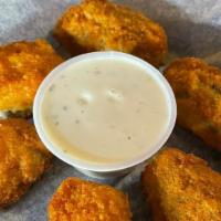 Jalapeno Poppers · Crispy cream cheese filled jalapenos fried to golden perfection and served with spicy mayo.