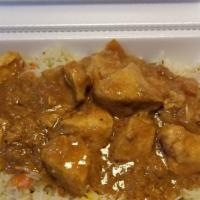 Chicken Curry · Boneless chicken cooked in curry sauce & masala served with rice.