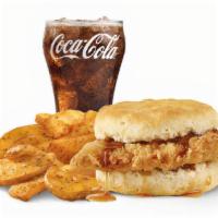Hot Honey Biscuit Combo · A crispy, chicken fillet, perfectly seasoned and topped with maple honey butter on a fluffy ...