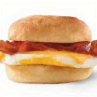 Classic Bacon, Egg & Cheese Sandwich · A fresh-cracked grade A egg, Applewood-smoked bacon, and melted American cheese on a warm br...