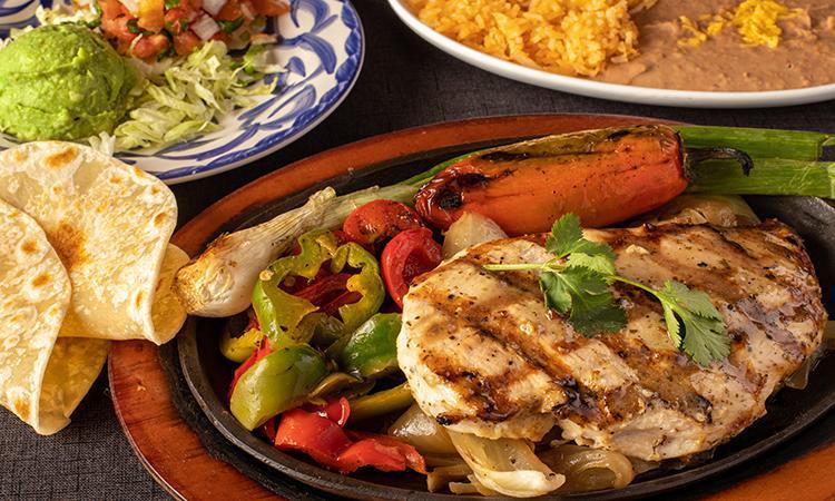Grilled Chicken Dinner · Grilled Chicken Breast served with Pico de Gallo, Guacamole, homemade tortillas, Mexican Rice, and Choice of Beans.