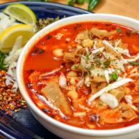 Traditional Menudo · The original Mexican hangover cure! Hominy and tripe in a red chile broth.  Served with oreg...