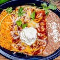 Cheeses Enchiladas · Two corn tortillas filled with melted cheese. Topped with melted cheese, red sauce and a sco...