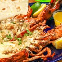 Puerto Nuevo Style Lobster · 1  1/4  to 1  1/2  pound Maine lobster.  Fried lobster served with Mexican style rice,  refr...