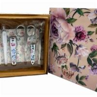 Pretty Girls Nails Manicure Set  · Gorgeous lacquer floral box holds an eight-piece manicure set. The box can be used again to ...