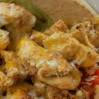 Legends Coney Taco · Spiced ground beef topped with chili, onions, lettuce, tomatoes and shredded cheese packed o...