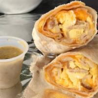 1/2 Lb Cowboy Burrito · These hearty breakfast burritos are made fresh every morning.  Your choice of 
