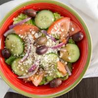 Greek Salad · A mixture of romaine lettuce, red onions, tomatoes, cucumber, and kalamata olives tossed in ...