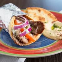 Gyro Sandwich · Our signature sandwich. Your choice of chicken, beef, or lamb gyro meat served with lettuce,...