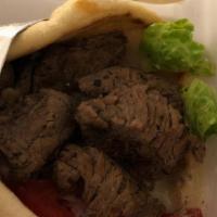 Shawarma Sandwich · Your choice of chicken, beef, or lamb, marinated and grilled to perfection, served with lett...