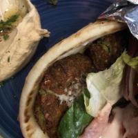 Falafel Sandwich · Falafel patties made from fava beans, garbanzo beans, onion, seasoned with herb and spices, ...