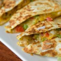 Jerk Quesadillas · Your choice of Chicken, Shrimp, or Callaloo filling. Tortilla wrap with chopped peppers, oni...