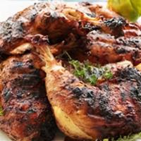 Jerk Chicken Dark Meat · Marinated in Judy’s special jerk seasoning then charred. Your choice of mild or spicy.