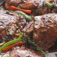 Brown Stew Chicken · Savory boneless chicken, spiced with Judy’s special seasonings in a rich brown stew.