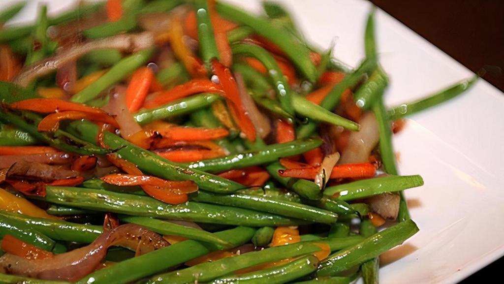 Green Beans · Sautéed with onions and spices.