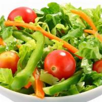 Side Salad · Romaine lettuce, tomatoes, bell peppers and onions with mango relish dressing.