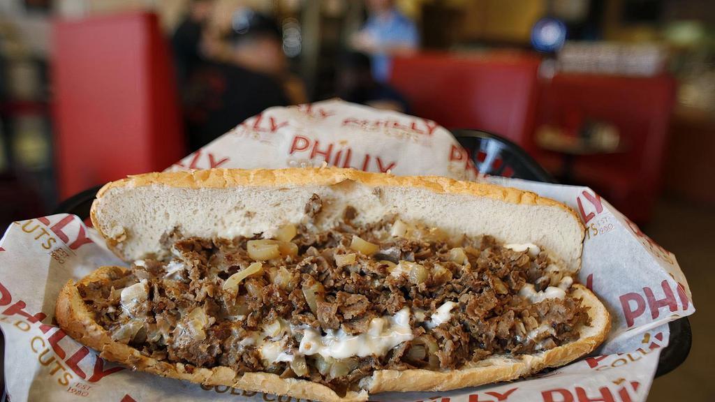 Cream Cheese Steaks · Steak, Mushroom, grilled onions, green peppers, jalapenos, Philly cream cheese.